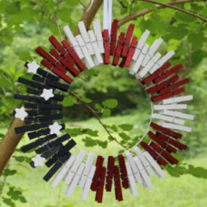 Red, white and blue wreath made of clothes pins