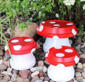 Red and white clay toadstool pots