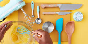 Cooking utensils on a yellow surface